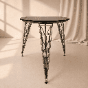 Table on three designer legs